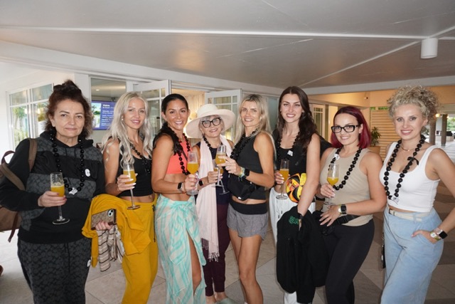 Group of women being welcomed in at Club Med Resort in Turks and Caicos